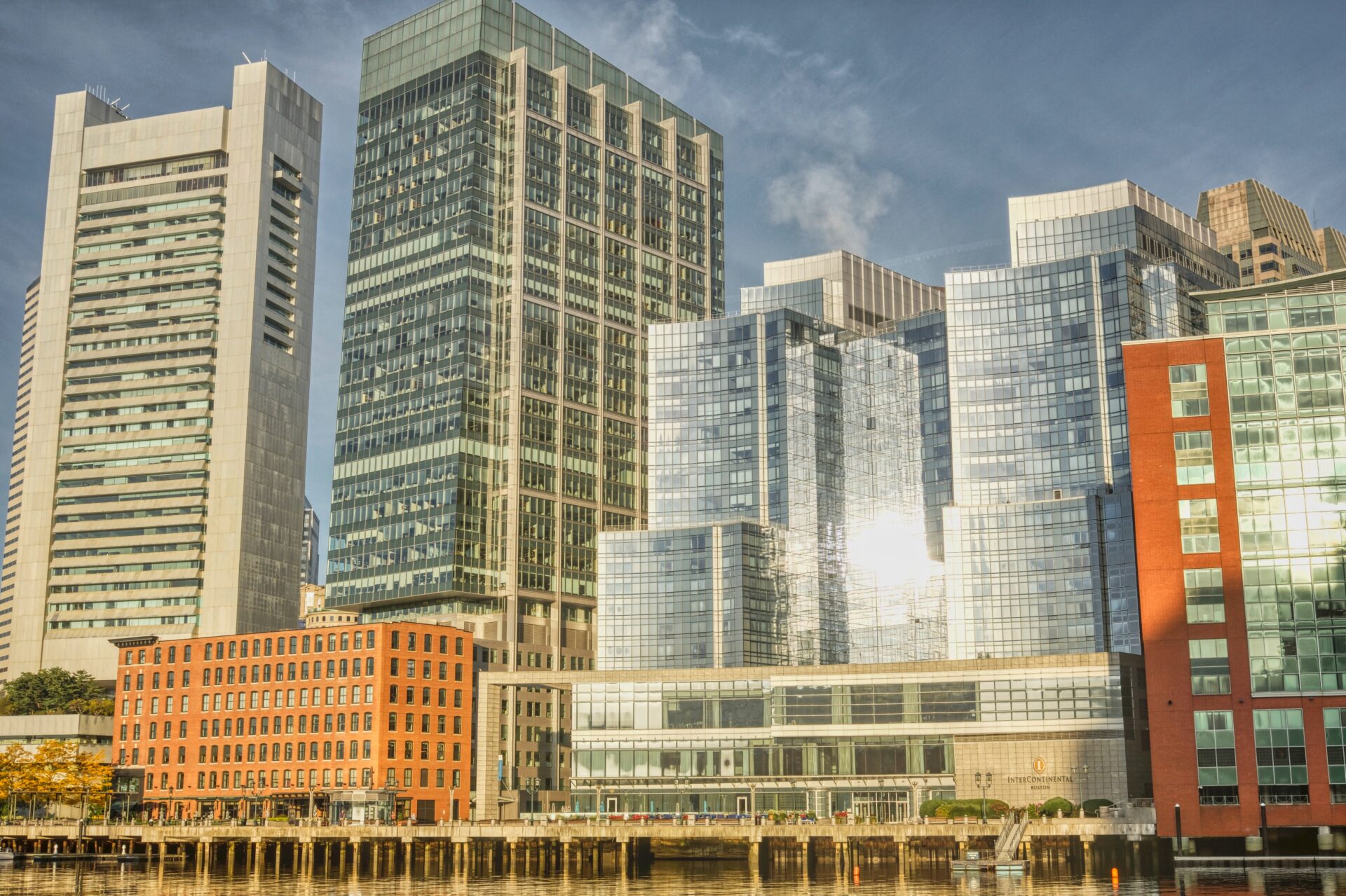 A city with many tall buildings and a sky background